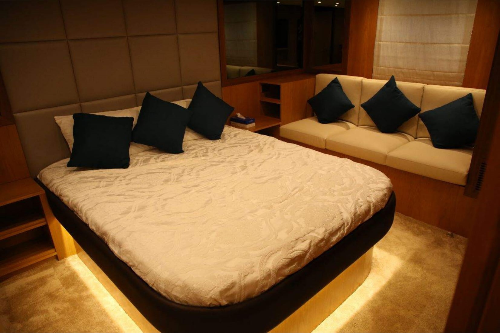 Integrity 70 ft Yacht: Cozy Sleeping Area with Sofa
