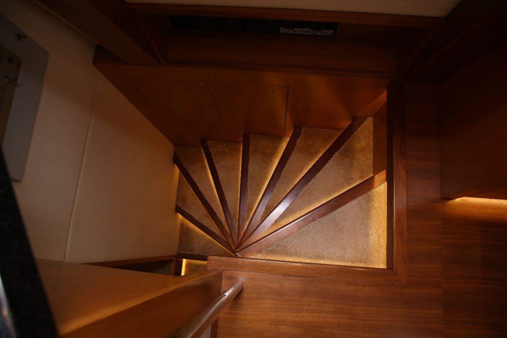 Integrity 70 ft Yacht: Elegant Wooden Staircase